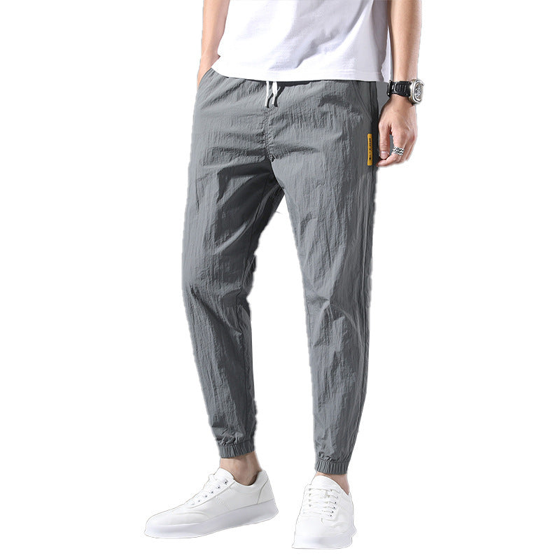 Summer Thin Ice Silk Nine - cent Pants For Male Students